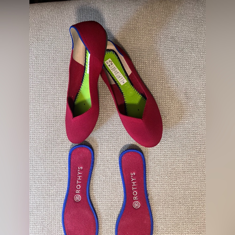 Red Authentic Rothy’s flats size 8.5